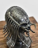 Close Up Of Upcycled Metal Alien Head Sculpture Close Up Of Upcycled Metal Alien Head Sculpture