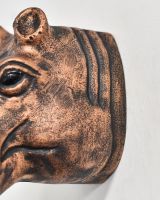 Close up of intricate detail on Copper Hippo Wall Bust