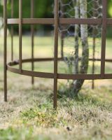 Close up of base detail on steel tree guard Close up of base detail on steel tree guard