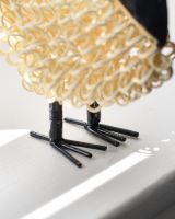 close up of feet detail on recycled cockerel sculpture