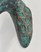 Aluminium Giraffe Head Mounted To The Wall In The Home