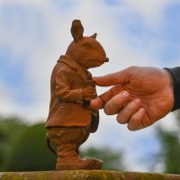 Side view of Cast Iron Mouse in Suit 