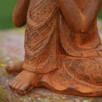Close up of detailing on Buddha Feet and Robe 