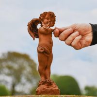 Cherub with Butterfly in Rustic Cast Iron 