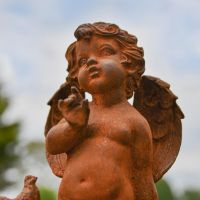 Rustic Cast Iron Sculpture with Cherub 