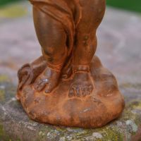 Close up of Rock Formation on Cherub Sculpture  Close up of Rock Formation on Cherub Sculpture