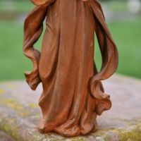 Close up of Robe on Winged Angel Garden Sculpture 