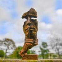 Abstract "Silencer" Sculpture in Garden 