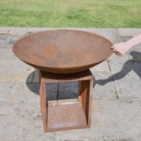 Rustic "Fury" Fire Pit & Wood Store in Garden Space 