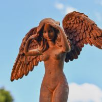 Close-Up of Rustic Cast Iron Free Standing Winged Angel Sculpture 