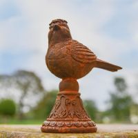Rustic Cast Iron Perched Floral Bird in Garden Setting 
