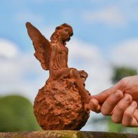 Rustic Cast Iron Sitting Fairy Sculpture to Scale