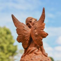 Reverse View of Rustic Cast Iron Sitting Fairy Sculpture