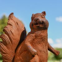 Close-Up of Rustic Cast Iron Squirrel Sculpture