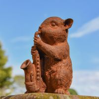 Rustic Cast Iron Saxophone Playing Chipmunk Sculpture in Situ