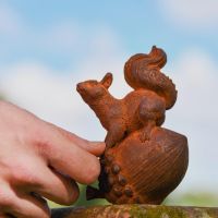Side view of Squirrel & Acorn Garden Sculpture 
