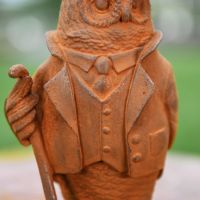 Close up of Suited Owl Garden Sculpture  Close up of Suited Owl Garden Sculpture