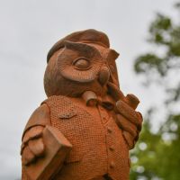 Close up of Owl with Pipe 