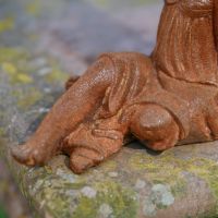 Close up of legs on Cast Iron Fairy Sculpture 