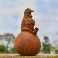 Rustic Cast Iron Sitting Pigeon Sculpture in Situ