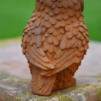 Close up on feathering on Cast Iron Garden Sculpture 