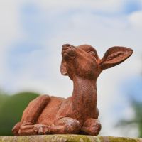 Rustic Cast Iron Sitting Foe Sculpture Looking Up