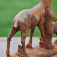 Close-Up of Rustic Cast Iron Doe & Calf Sculpture