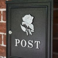 Close up of Silver Rose Motif & POST lettering 