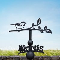 Coal tit weathervane in a summery setting