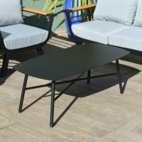 Close up of contemporary coffee table on outdoor sofa lounge set