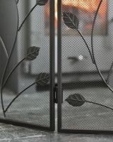 Close up of mesh detailing on four fold fire guard Close up of mesh detailing on four fold fire guard