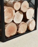 Close-Up of Contemporary "Diamond" Design Log Holder in Use