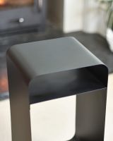 Close-Up of Kindling Storage on Contemporary Black Log and Kindling Store Close-Up of Kindling Storage on Contemporary Black Log and Kindling Store