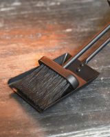 Close-Up of Contemporary Brush and Pan Set with Stand Close-Up of Contemporary Brush and Pan Set with Stand