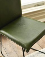 Seat Close Up of Contemporary Olive Green Leather and Black Steel Chair