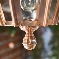 Close-up of the Finial on the Bottom of the Copper Concordia Hexagonal Garden Hanging Lantern Close-up of the Finial on the Bottom of the Copper Concordia Hexagonal Garden Hanging Lantern