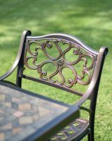 Close-up of the Traditional Scroll Heart Pattern Design on the Back of the Chair