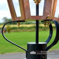 Close-up of the Lantern"s Frog Collar and Brass Fixings