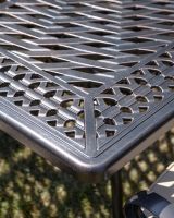 The "Highgrove" 8-Seater Luxury Garden Dining Set - Antique Copper Table Lower Table Corner Close Up The "Highgrove" 8-Seater Luxury Garden Dining Set - Antique Copper Table Lower Table Corner Close Up
