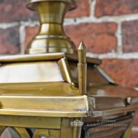Corner finial on brass Gothic lantern