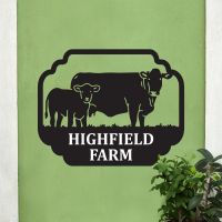 Steel Cow & Calf House Name Sign On Green Wall Steel Cow & Calf House Name Sign On Green Wall