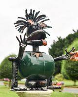 Scale image of Chucky the Crazy Recycled Metal Robot Sculpture