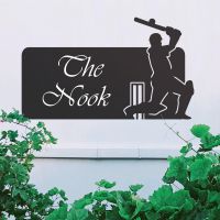 Black Cricket Player Iron House Name Sign on a White Wall