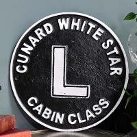 "Cunard White Star" Shipping Line Cast Iron Reproduction Sign in Situ Next to a Blue Wall "Cunard White Star" Shipping Line Cast Iron Reproduction Sign in Situ Next to a Blue Wall