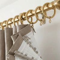 Curtain Rings in a Plain Brass Finish Shown on a Curtain Pole in a Contemporary Home - Digital Illustration Curtain Rings in a Plain Brass Finish Shown on a Curtain Pole in a Contemporary Home - Digital Illustration