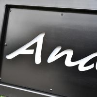 Close-up of the White Text on the Sign Close-up of the White Text on the Sign