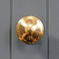 Solid brass simplistic centre door knob
