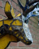 ‘Glint’ the Stag Head Mount Wall Art mounted on brick wall close up of geometric design