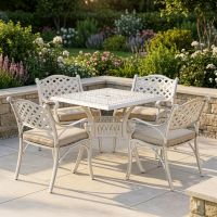 Deluxe "Blanche" Outdoor Dining Set in Situ on an Outdoor Garden Patio with cushions digital illustration