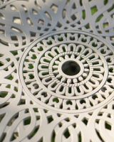 Close-Up of Pattern on Circular Table & Chair Set